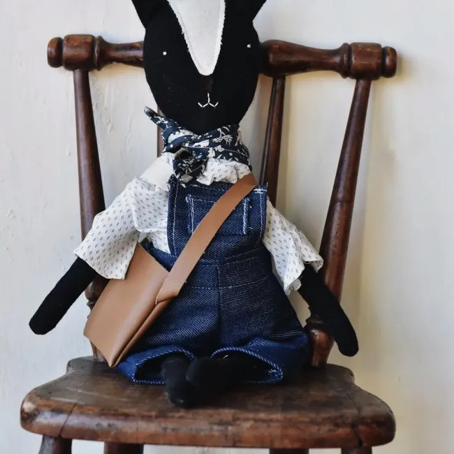 Woolgrass Farm Scout the Skunk Doll in Denim Overalls